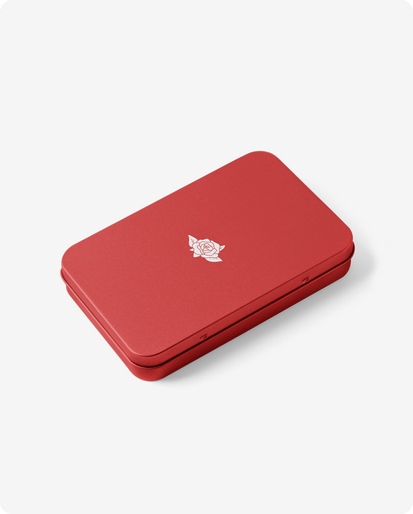 Child-resistant slide tins
